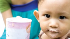 One parent supplements her child's diet after adopting a malnourished child.